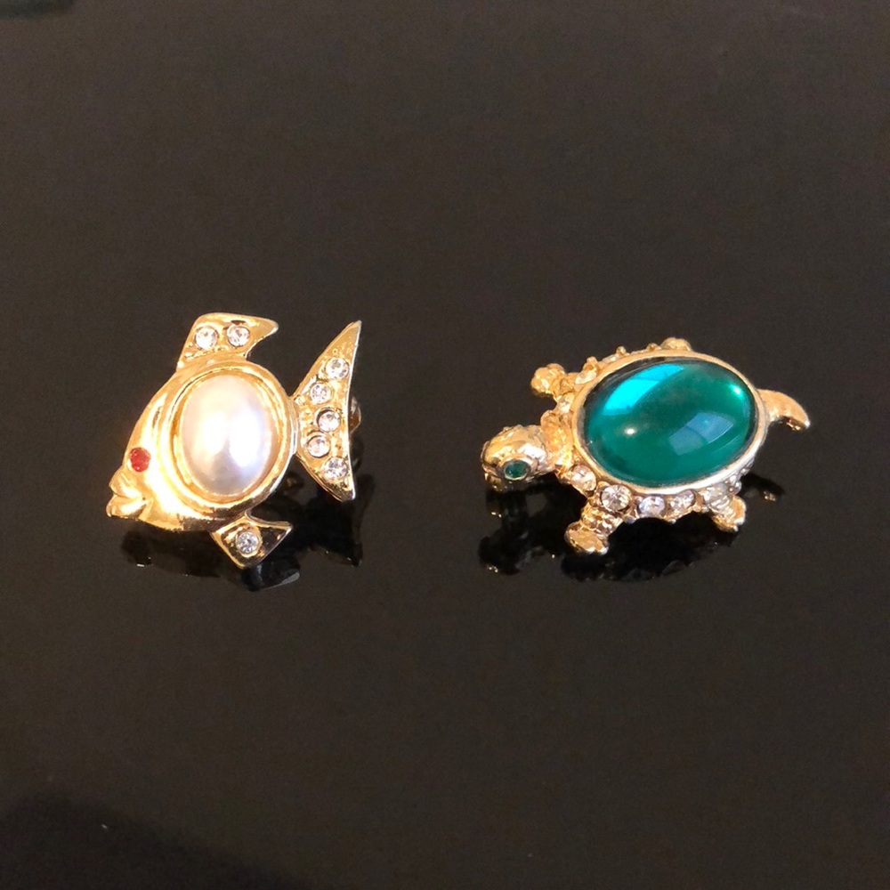 Fish and turtle brooches